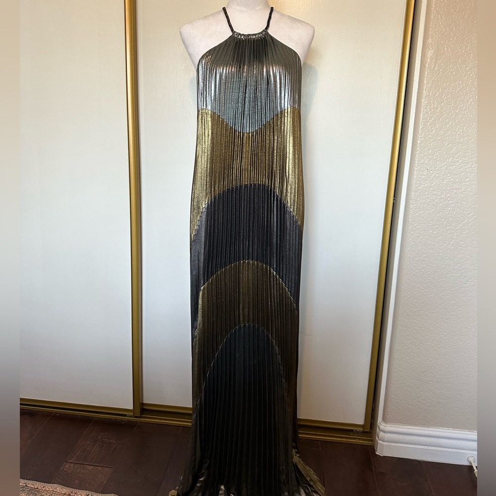 Grecian column dress in metallics, halter neckline, pleated, full length.